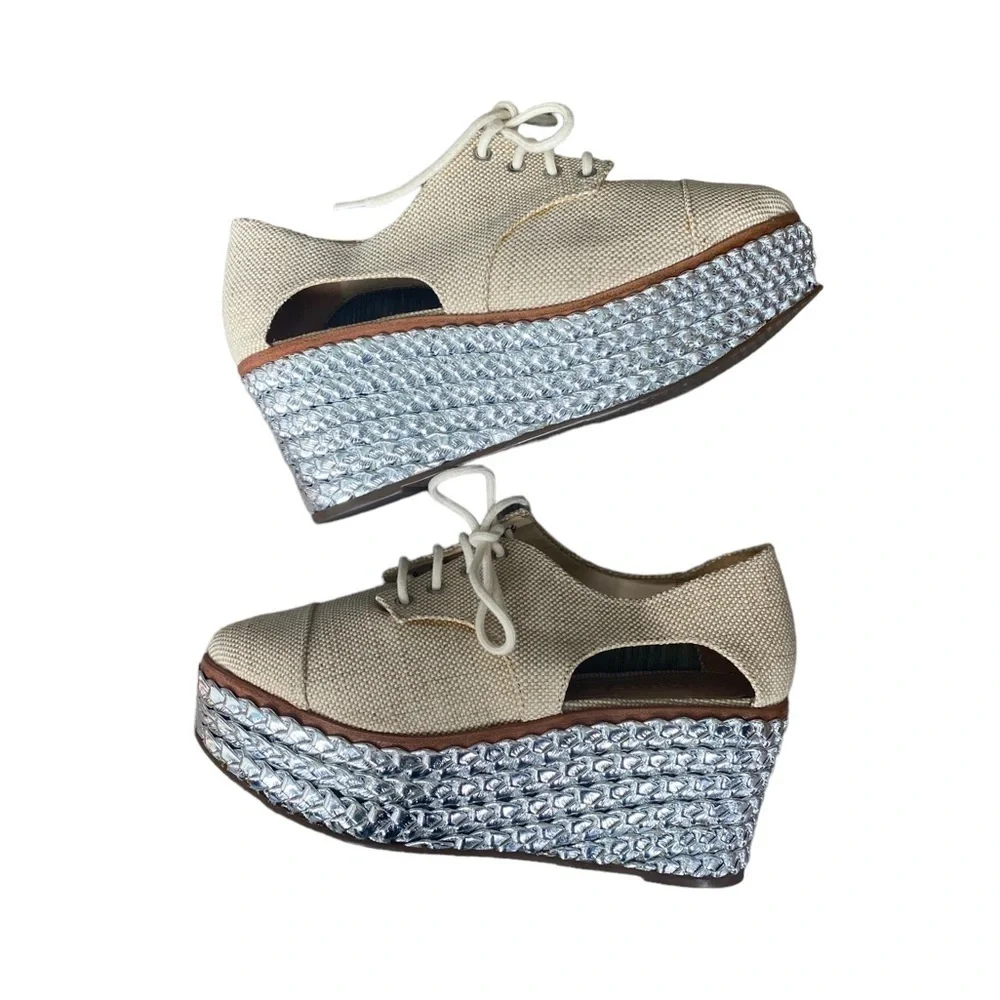 SCHUTZ Cream Lace-Up Platform Wedges with Silver Braided Sole